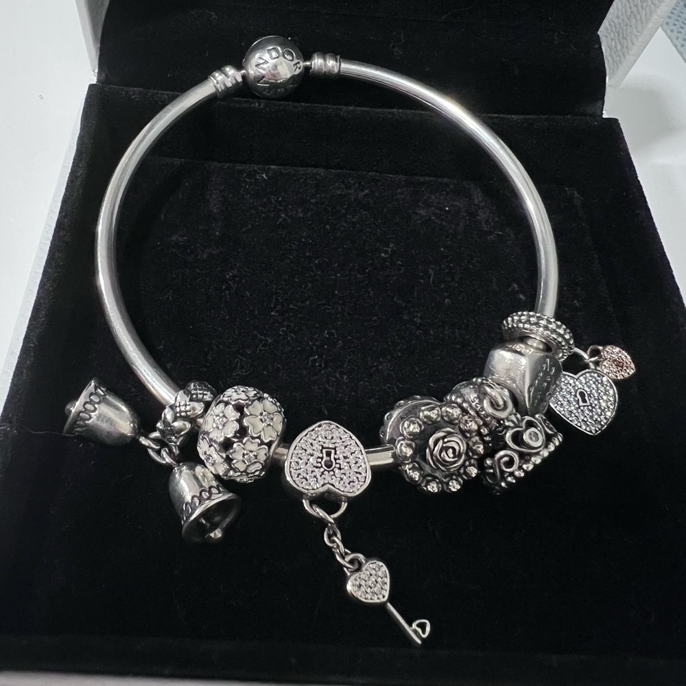 Authentic Pandora bangle bracelet with charms.SIZE 6.7in = 17 cm.